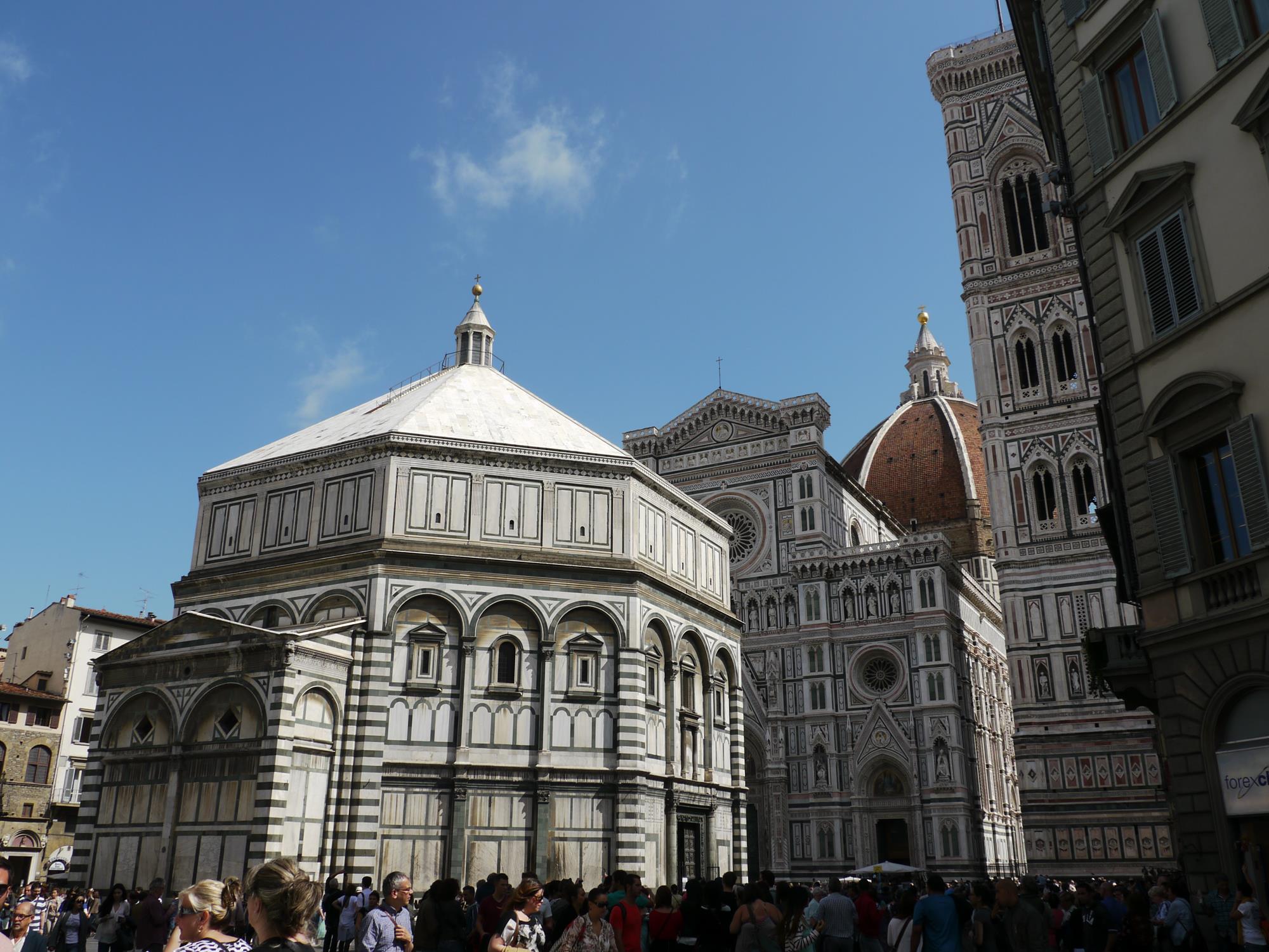 Florence Cathedral's baptistry (front), facade, bell tower and the red tiled Dome, or Duomo.