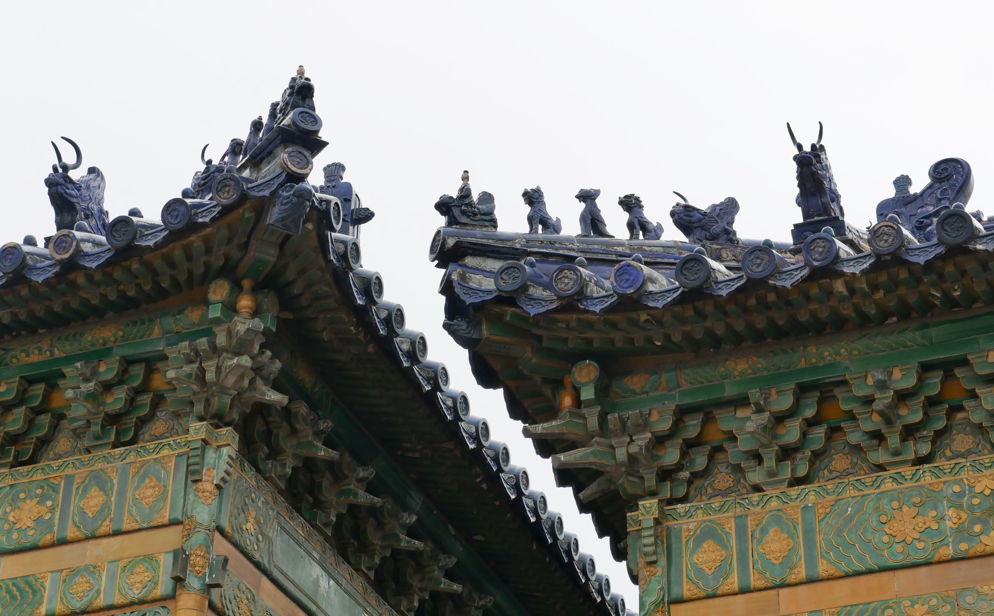 Roofs at the Temple of Heaven. These ceramic guardians are a classic feature of old Chinese buildings