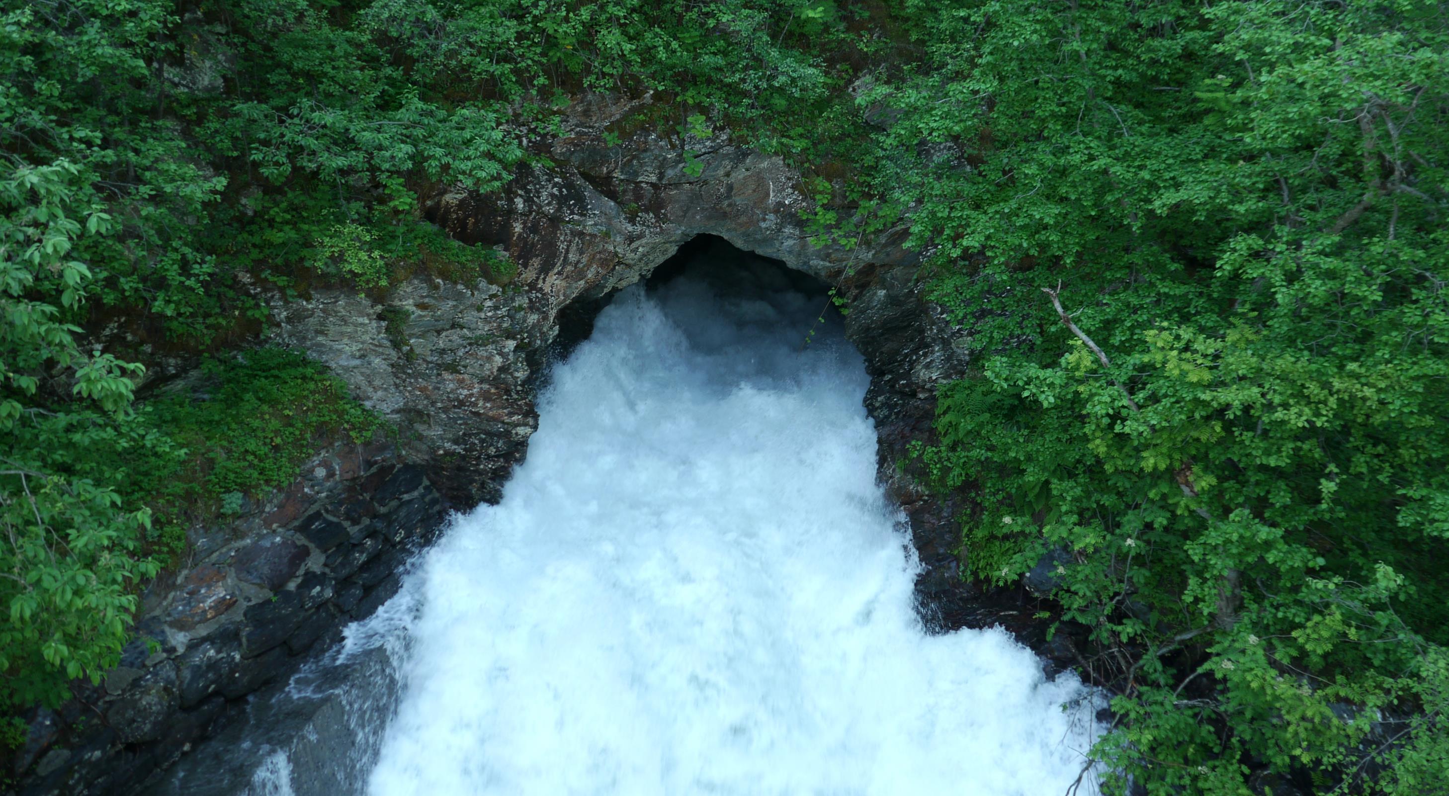 River tunnels in Flåm Valley divert water from the railway line