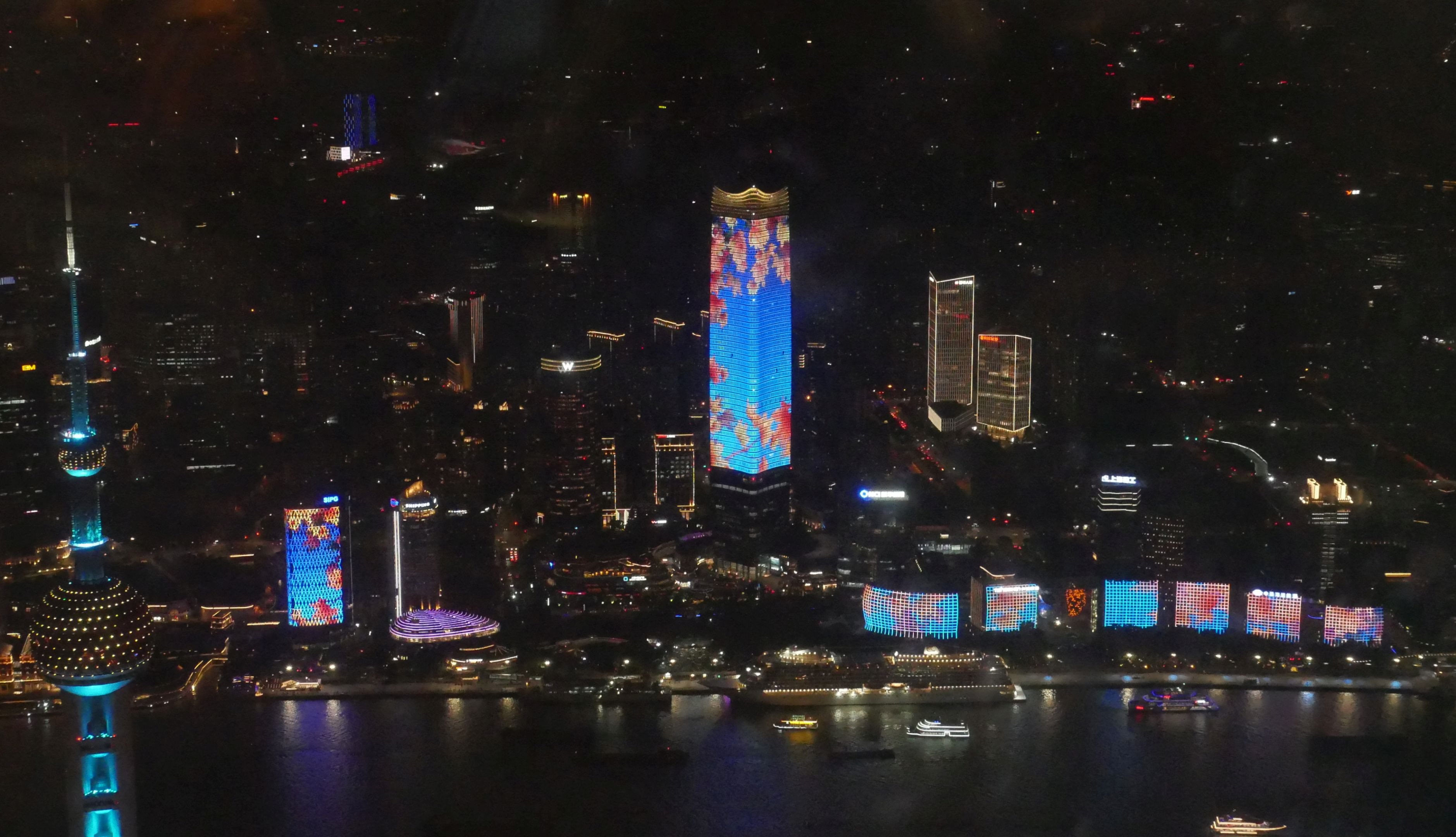 Co-ordinated light show on Shanghai buildings, from Shanghai Tower